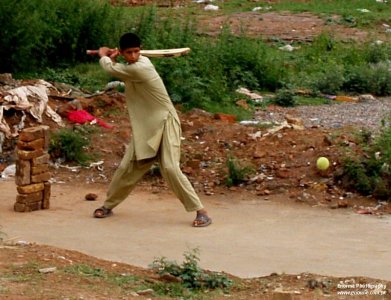 street_cricket_pakistan_by_5227171-d2ynwwv.jpg
