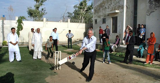 Cameron Munter playing cricket with kids in Quetta.jpg