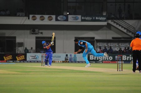 Khalid Latif playing an aggressive shot.JPG