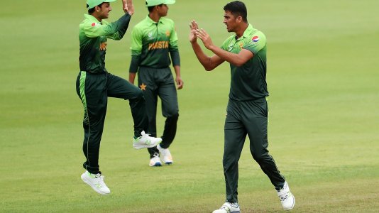 Arshad-Iqbal-of-Pakistan-R-takes-a-wicket.jpg