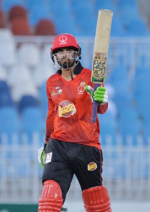 Umar Amin celebrates this hundred. He reached this milestone in  88 balls.jpg
