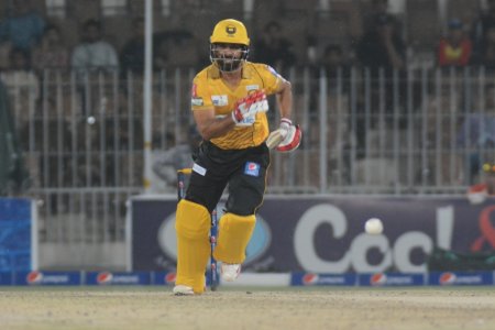 Muhammad Hafeez played a strait drive.JPG