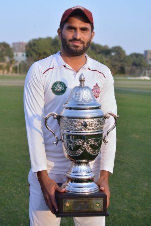 Naved Yasin captain of Southern Punjab with the winners trophy of Quaid-e-Azam Trophy 2nd XI Tou.jpg