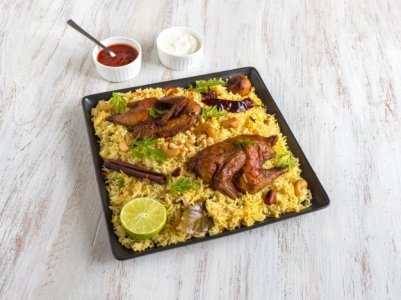 homemade-chicken-biryani-arabic-traditional-food-bowls-kabsa-with-meat-top-view_158388-2698.jpg