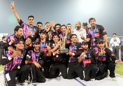 Faisalabad wolves winner of Faysal Bank T-20 super 8 tournament  posing with the trophy.jpg