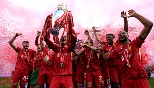Virgil-van-Dijk-lifts-Premier-League-Trophy.webp