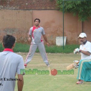 Ijaz Ahmed & Mohammad Talha provide fielding practice to Taufiq Umar