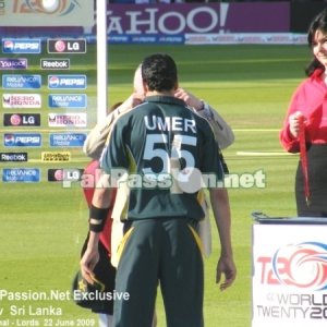 Umar Gul receiving his medal