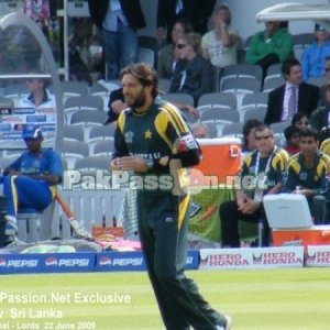 Shahid Afridi on his way to bowl another delivery