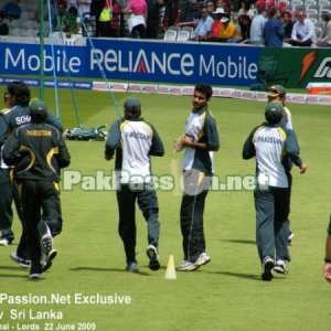 Members of the Pakistani team warm up