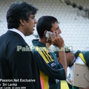 Younis Khan talking on the phone