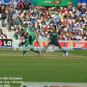 Side on view of Mohammed Amir in his delivery stride