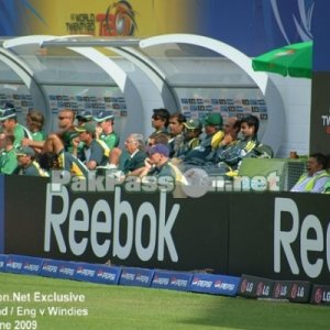 Pakistani and Irish team in their respective team dugouts