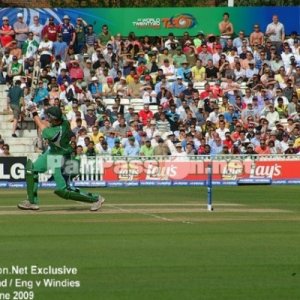 An Irish batsman heaves one towards deep mid-wicket.