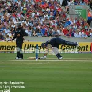 Ravi Bopara stretches at the crease