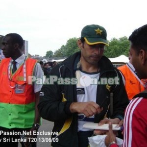 Misbah ul Haq signs an autograph for a fan