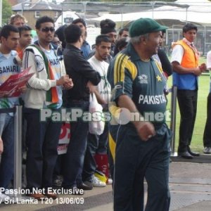 Intikhab Alam makes his way on to the field