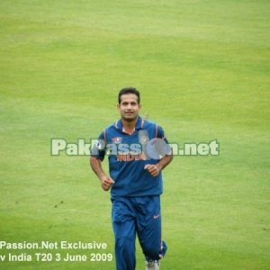 Irfan Pathan jogs his way back to his fielding position