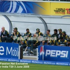 Pakistani team and coaching staff in the dugout