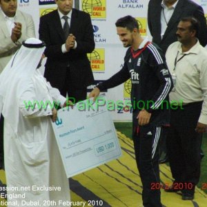 England's Kevin Pietersen receives a cheque