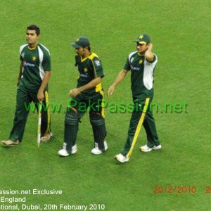 Umar Akmal, Sarfraz Ahmed and Saeed Ajmal leaving the field