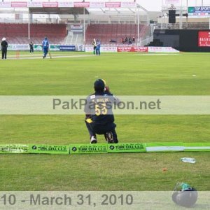 Shoaib Malik drinks some water while fielding