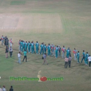 Players shake hands at the end of match