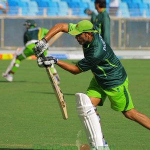 Abdur Rehman showing off his batting skills during practice