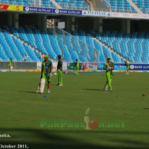 Pakistan's cricket team practicing in the sunny atmosphere