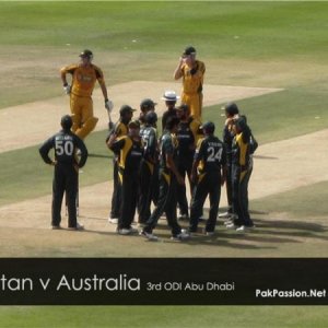 Players wait anxiously for the Third Umpire's decision