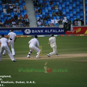 Younis Khan plays a shot and everyone looks towards the ball