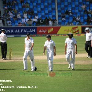 End of the session: Alastair Cook, Ian Bell and Monty Panesar walk off the 