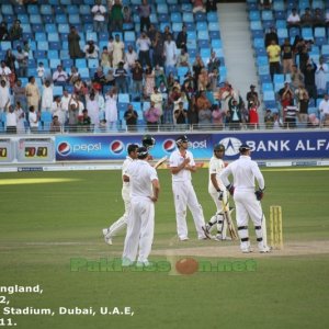 Younis Khan walks back to the batting crease