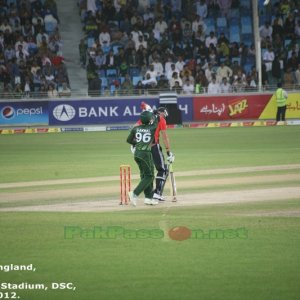 Umar Akmal busy behind the stumps