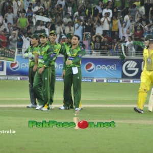 Saeed Ajmal and team celebrating after taking a wicket