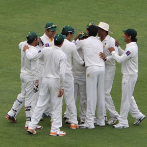 Pakistan team celebrate a wicket