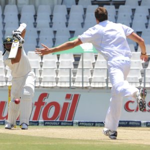 Azhar Ali plays a straight drive past Morne Morkel's outreached hands