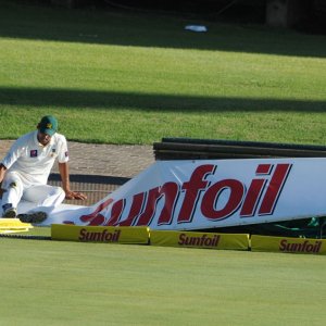 Pakistan fielder runs into advertising board attempting to save a boundary