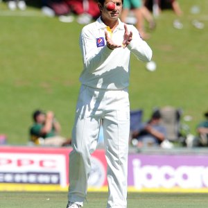 Saeed Ajmal with ball in hand gets ready to bowl