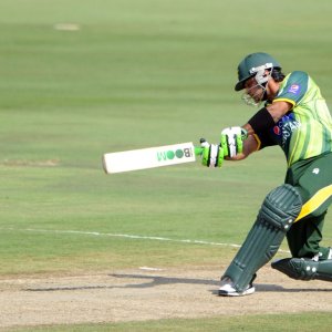 Mohammad Hafeez hits one through the off-side during his match-winning knoc