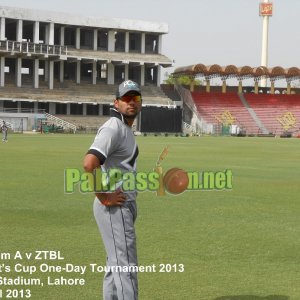 Khurram Manzoor poses for a picture in the outfield