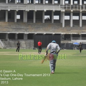 Umar Amin walks into bat