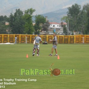 Imran Farhat and Dav Whatmore have a discussion during the training camp