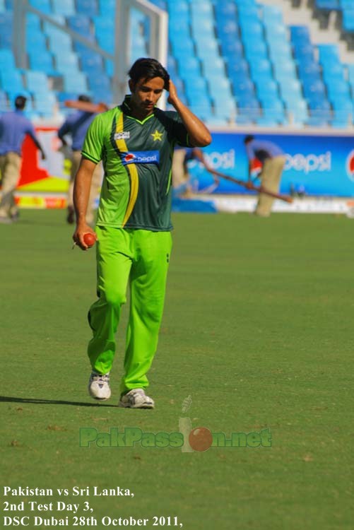 Aizaz Cheema getting ready to practice his bowling