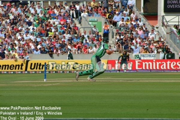 An aerial shot is played by an Irish batsman