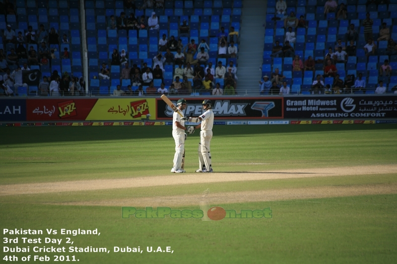 Azhar Ali raises his bat to the crowd
