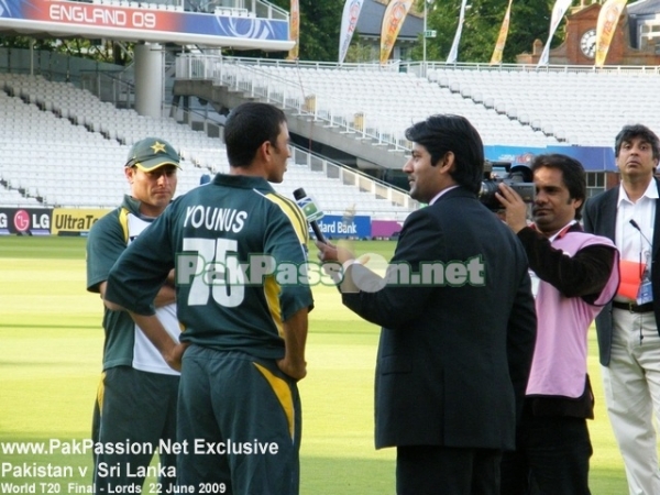 Captain Khan talks with journalists