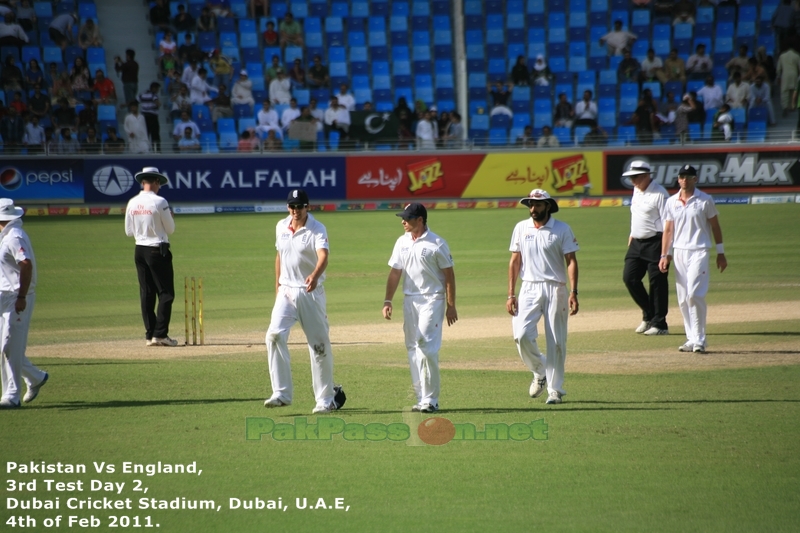 End of the session: Alastair Cook, Ian Bell and Monty Panesar walk off the 