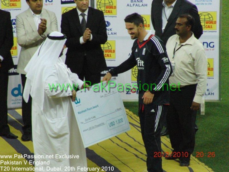 England's Kevin Pietersen receives a cheque