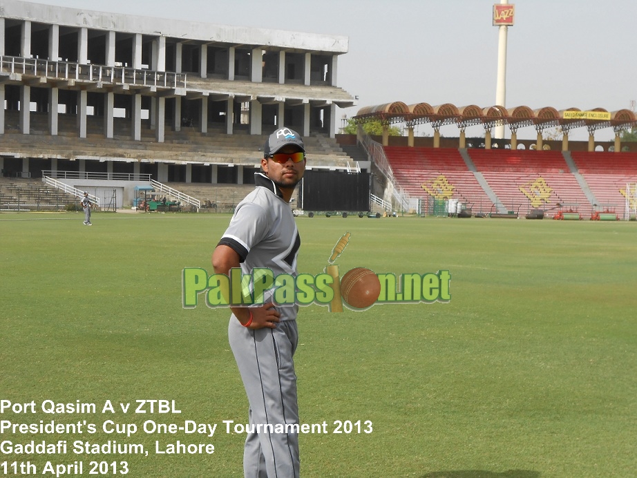 Khurram Manzoor poses for a picture in the outfield